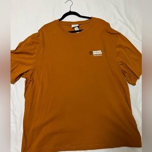 Men’s H&M burnt orange globe graphic tee shirt